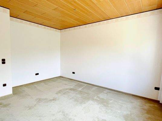 Einliegerwohnung: Wohnzimmer mit Terrassenzugang