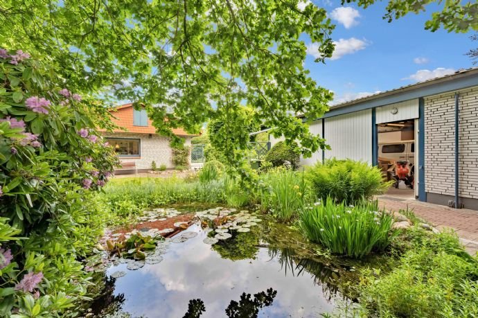 Sehr gepflegtes Haus mit optionaler 1,9 ha Hauskoppel und großer Garage/Werkstatt an der Treene