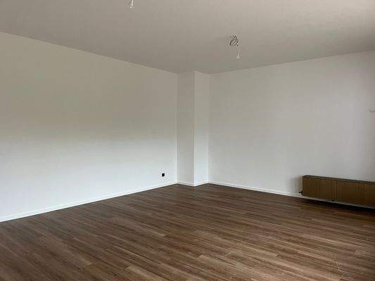 Wohnzimmer mit zusätzlichem Kamin