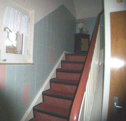 Treppenhaus mit Zugang zum Keller