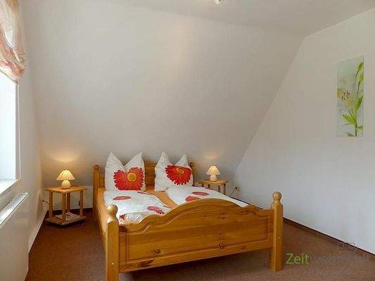 Doppelbett im Schlafzimmer