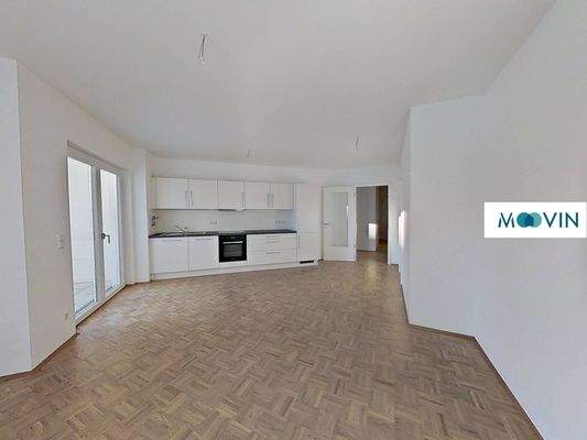 Ansicht III: Wohn- und Esszimmer mit Blick auf die Einbauküche