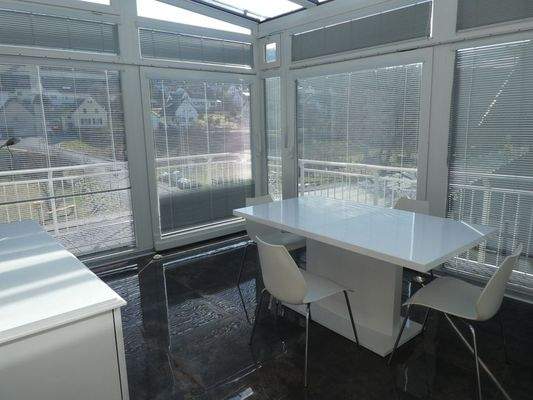 Wintergarten mit Essbereich