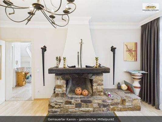 05_Gemauerter_Kamin_gemütlicher_Mittelpunkt