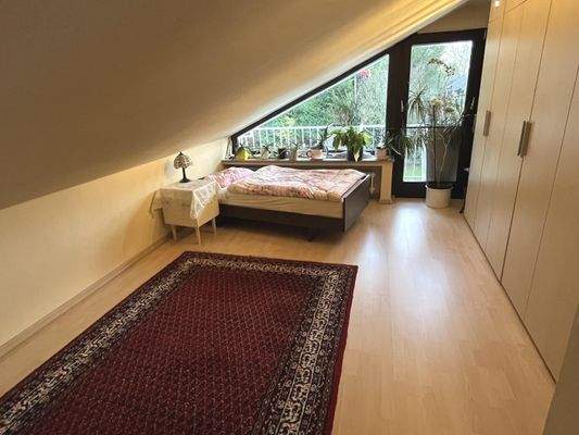 Eines der Schlafzimmer im Dachgeschoss