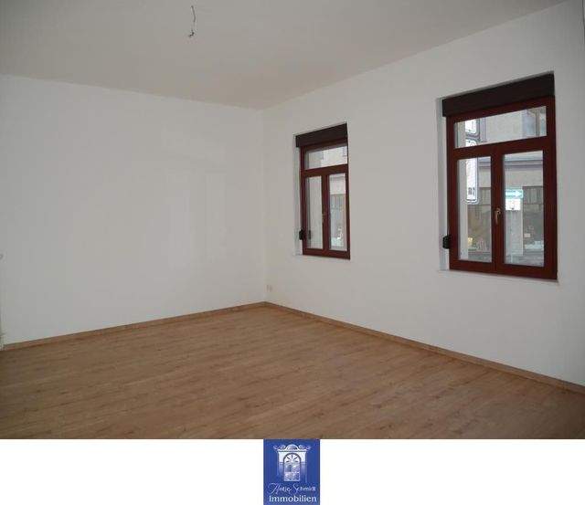 Ihre perfekte Familienwohnung mit Balkon und Blick ins Grüne in sehr schöner Lage! - Photo 1