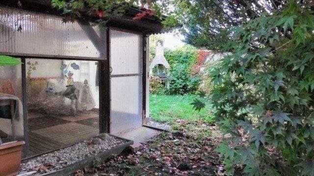 überdachte, umbaute Terrasse