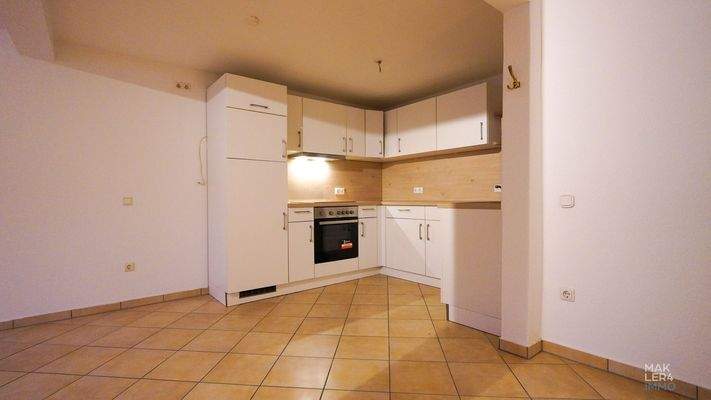 Wohn- und Essbereich mit Einbauküche