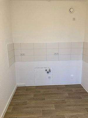 Küche mit Fliesenspiegel