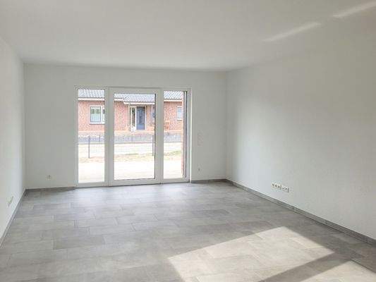 Wohn- und Esszimmer mit offener Küche