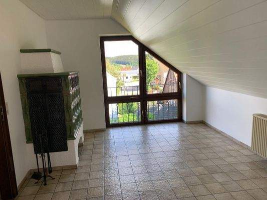 Eßbereich mit Kachelofen