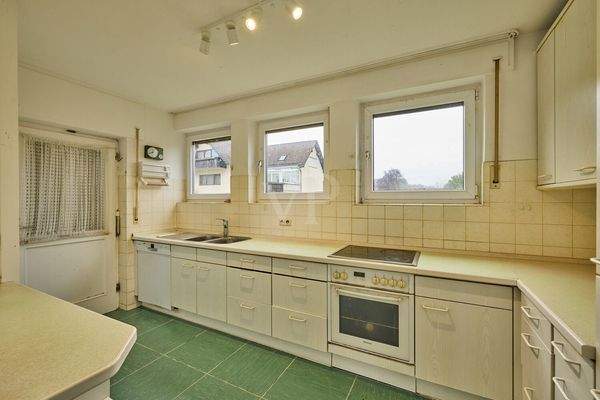 Küche mit Zugang zum Garten