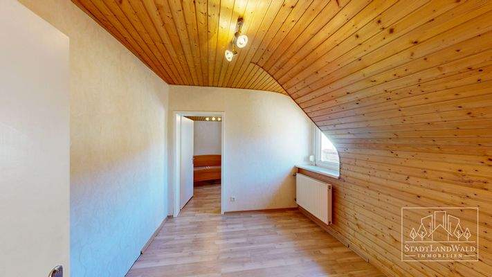 Schlafzimmer 1  - OG