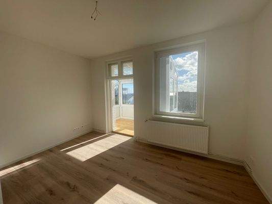 Wohnzimmer mit Wintergarten