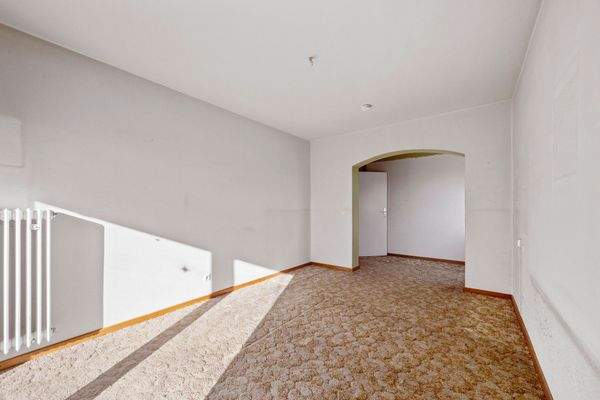 Elternschlafzimmer mit Blick in die Ankleikde