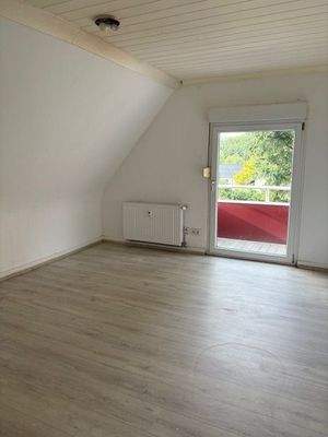 Wohnzimmer mit Balkon