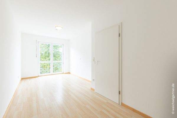 Schlafzimmer mit Balkonzugang