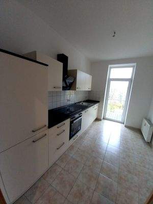 Küche mit Einbauküche.jpg