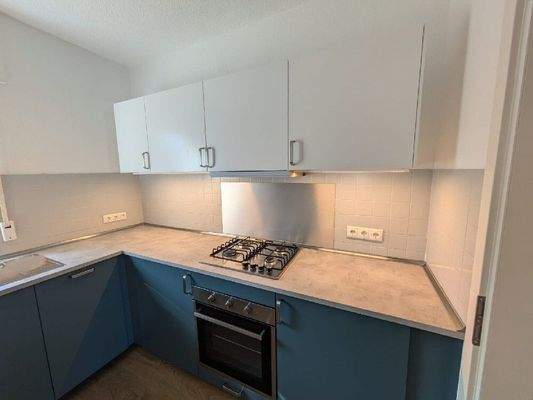 Foto mit Teil der möblierten Küche