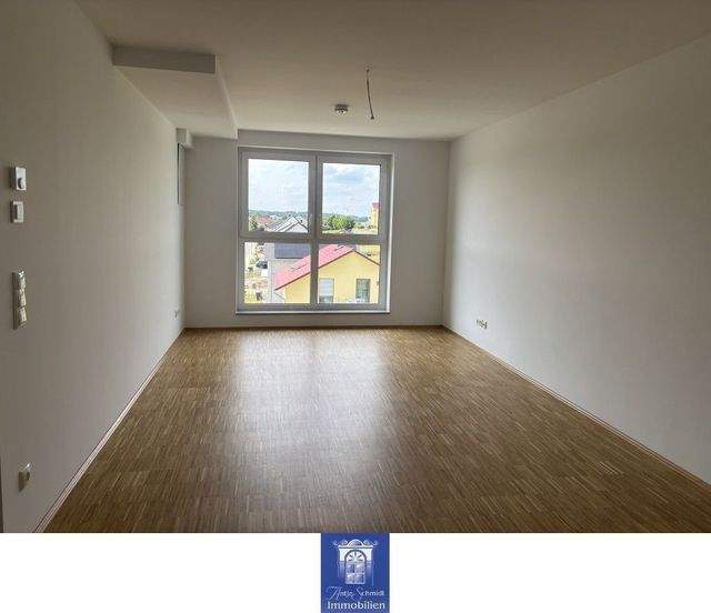 Perfekte Dachwohnung im Neubau! EBK, Lift und Erstbezug! - Foto 1