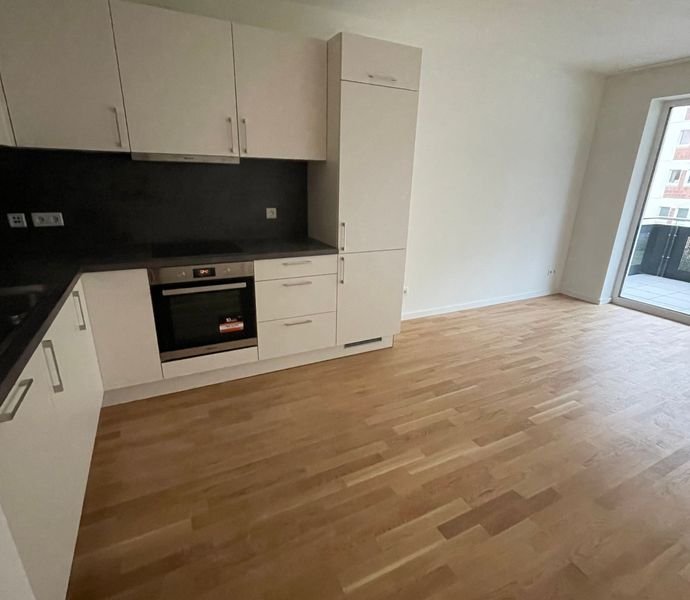 KfW 40-Neubau-Wohnung mit EBK, Balkon, Echtholzparkett, HWR, Fahrstuhl, Tiefgarage