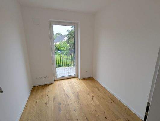 Gästezimmer mit Balkonzugang