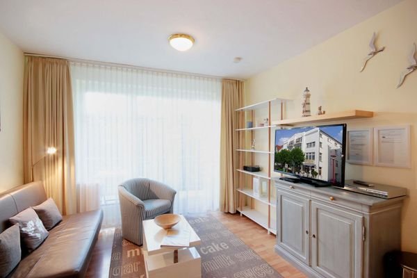 Wohnbereich mit Zugang zum Balkon