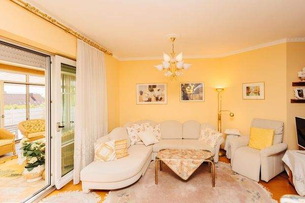 Wohnzimmer mit Wintergarten