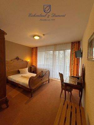 Einzelzimmer mit Teppich