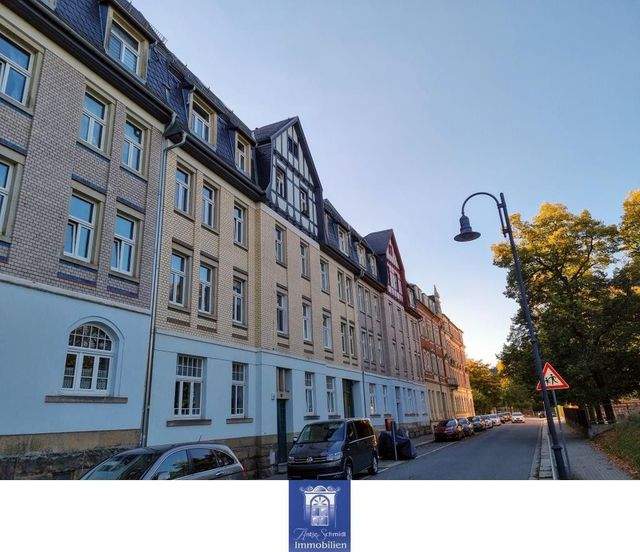 Sehenswerte Dachgeschosswohnung mit Balkon! - Foto 3