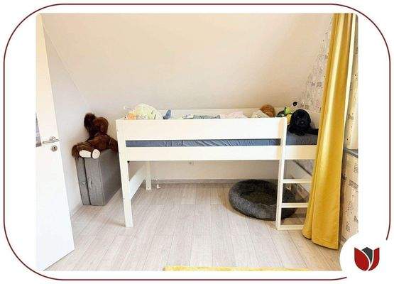 Gemütlicher Schlafbereich im Kinderzimmer