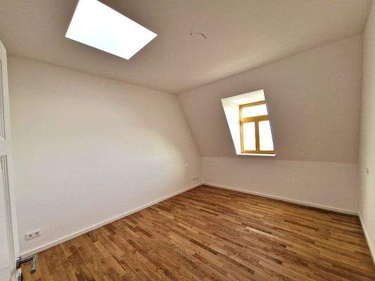 Schlafzimmer mit Lichtkuppel