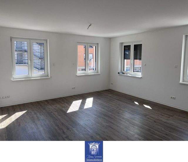 Modern ausgestattete Familienwohnung mit Balkon und Fußbodenheizung! - Foto 2