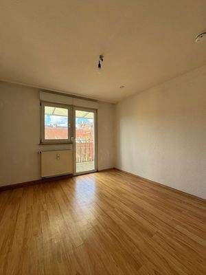 Schlafzimmer mit Balkonzugang