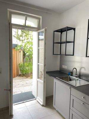 Küche mit Ausgang auf die Terrases