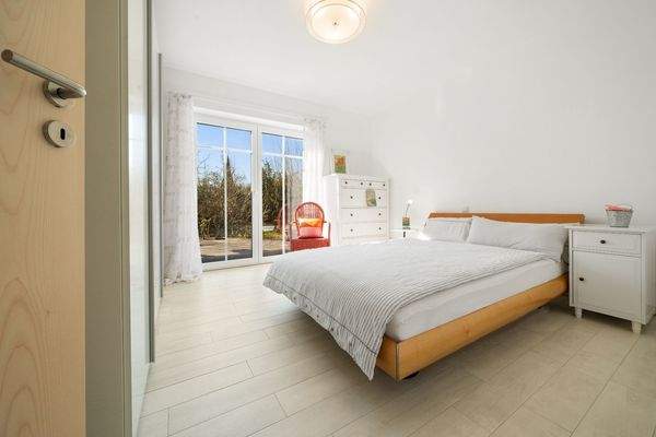 Hauptschlafzimmer mit Terrassenzugang