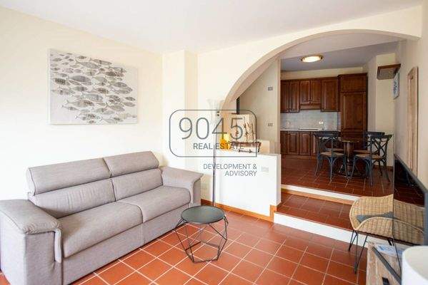 Charmante Reihenhausvilla mit traumhaftem Seeblick und privatem Garten in Torri