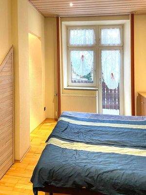 Schlafzimmer mit Balkon