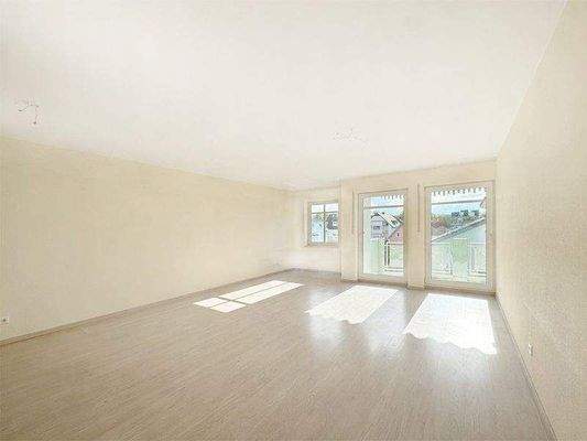 Wohn-/Essbereich mit Balkonzugang