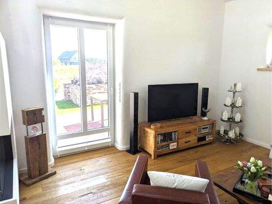 Wohnbereich mit Ausgang zur Terrasse