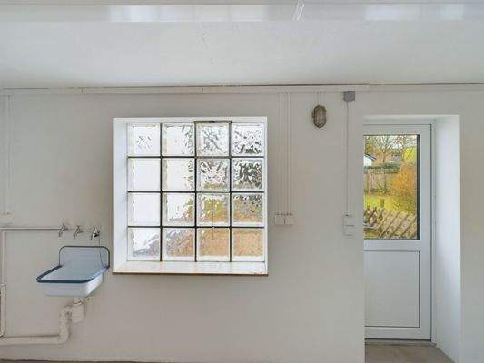 Werkstatt mit Gartenzugang