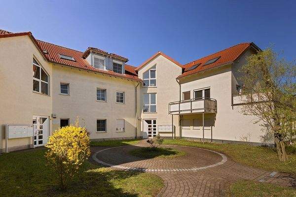 Mehrfamilienhaus mit Garten