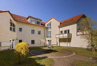 Mehrfamilienhaus mit Garten