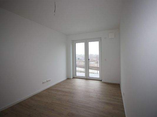 Kinderzimmer mit Balkonzugang 