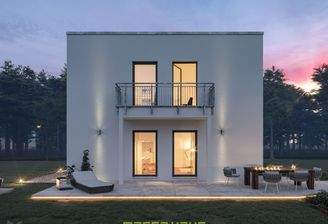 Stilvolles Fertighaus Lifestyle von massa haus: Zeigt eine glatte, helle Fassade, dunkle Fensterrahm