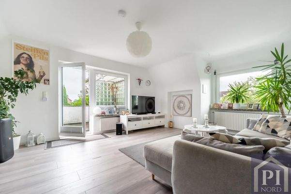 Wohnzimmer im Dachgeschoss mit Balkon