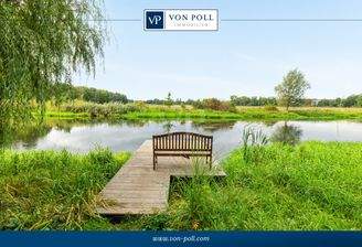 Blick über die Spree und anliegende Wiesen