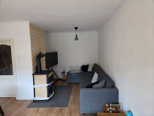 Wohnzimmer mit Kamin