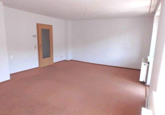 Wohnzimmer mit Balkon