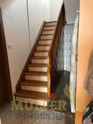 Treppenhaus EG->OG - ©Müllerimmobilien